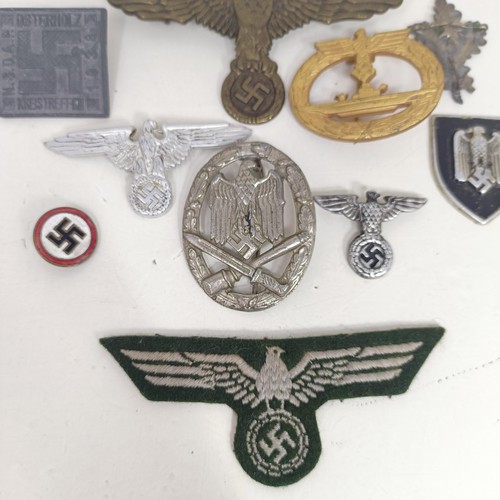 231 - A group of assorted German items, including a Kriegsmarine U Boat badge