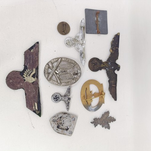 231 - A group of assorted German items, including a Kriegsmarine U Boat badge