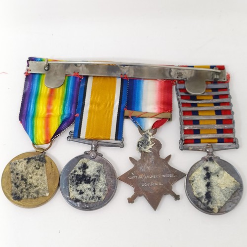 251 - A group of four medals, comprising a Queen's South Africa Medal, with Belmont, Modder River, Relief ... 