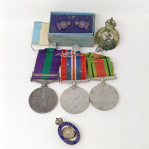 252 - A group of three medals, comprising a War Medal, Defence Medal and a General Service Medal 1918-62, ... 