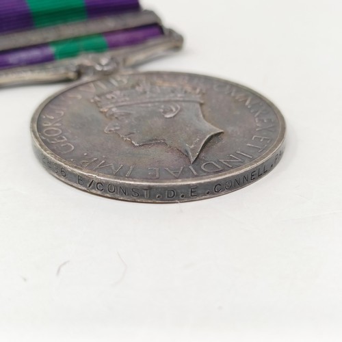 252 - A group of three medals, comprising a War Medal, Defence Medal and a General Service Medal 1918-62, ... 