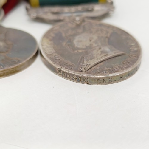 243 - A group of four medals, comprising a Defence Medal, a War Medal, a Queen Elizabeth II Coronation Med... 