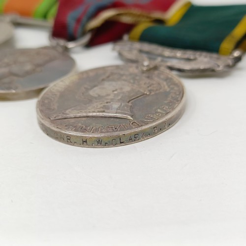 243 - A group of four medals, comprising a Defence Medal, a War Medal, a Queen Elizabeth II Coronation Med... 