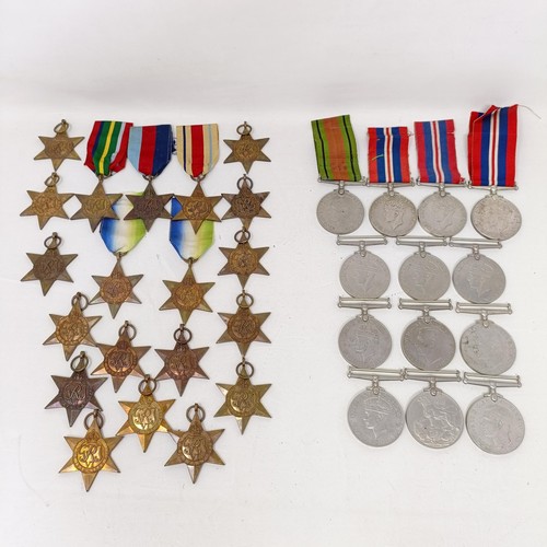 244 - A large group of assorted WWII Medals and Stars