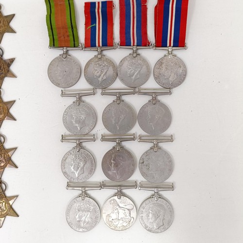 244 - A large group of assorted WWII Medals and Stars