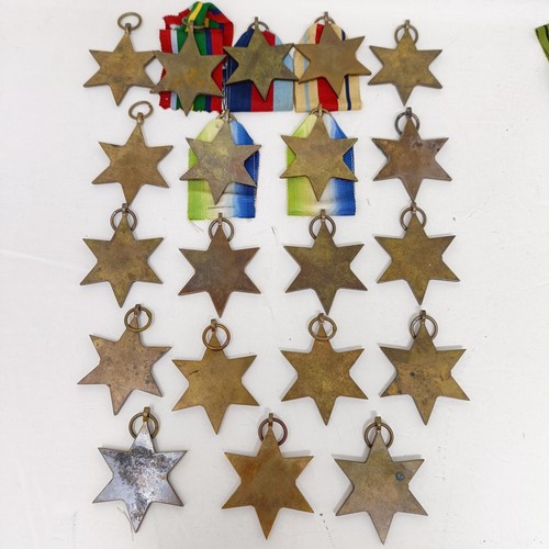 244 - A large group of assorted WWII Medals and Stars