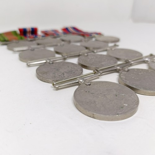 244 - A large group of assorted WWII Medals and Stars