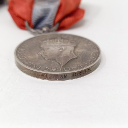 246 - A group of four medals, comprising a 1914-15 Star, and an Imperial Service Medal, awarded to 55771 D... 