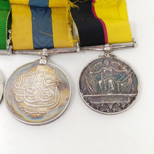 248 - A group of six medals, comprising a Queen's Sudan 1896 Medal, a Khedives Sudan 1896 Medal, a Queen's... 