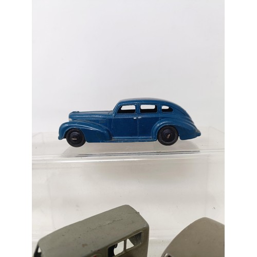 448 - A Dinky Toys Lincoln Zephyr, two lorries, one with a trailer, and other vehicles (8)