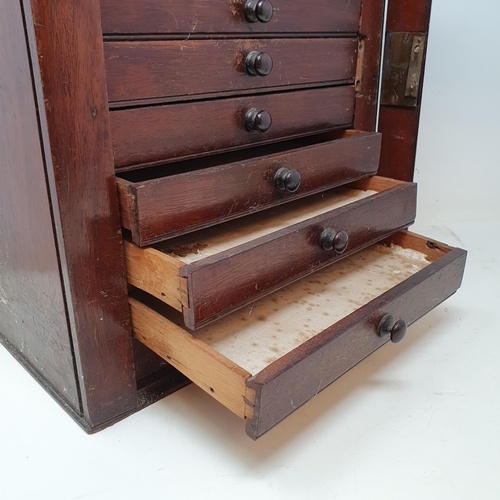 119 - A late 19th century mahogany table top collectors cabinet, having ten drawers, 27.5 cm wide