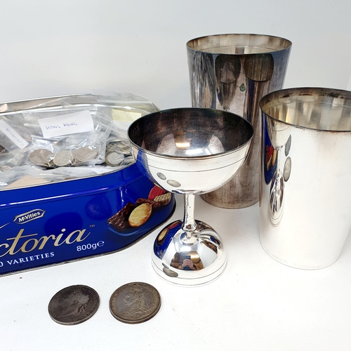 121 - A George IV crown 1821, another crown, 1887, other assorted coins, and a silver plated communion set