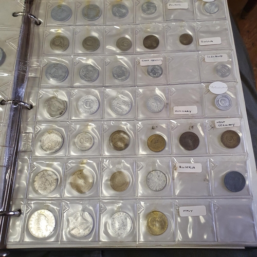 90 - A George IV crown, 1821, an USA Liberty dollar, 1921, and other coins, in two albums