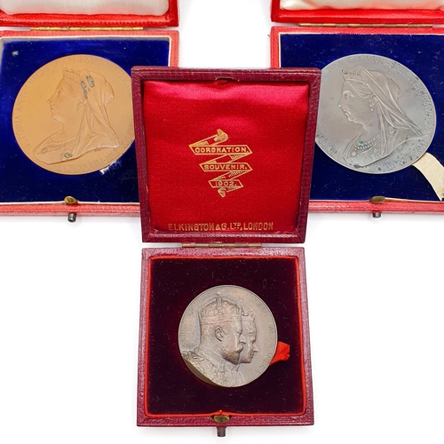 131 - A Queen Victoria silver Diamond Jubilee medallion, boxed, another similar, and an Edward VII silver ... 