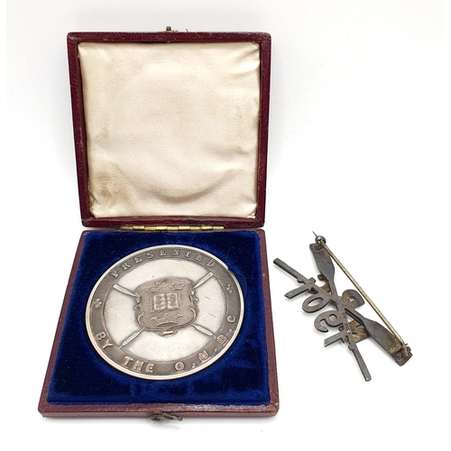 132 - An Oxford University Boat Club Challenge Prize Medal Four Oars, boxed, and a silver NRC 1901 brooch,... 