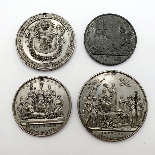 137 - A Queen Victoria Coronation medallion, another similar, a William IV Coronation medallion, and one o... 