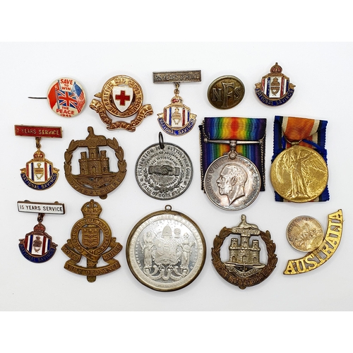 157 - A British War Medal and Victory Medal pair, awarded to 200701 Gnr C Watts RA, a group of badges and ... 