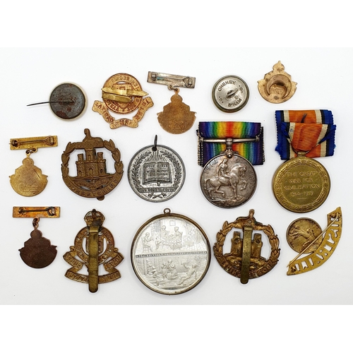 157 - A British War Medal and Victory Medal pair, awarded to 200701 Gnr C Watts RA, a group of badges and ... 