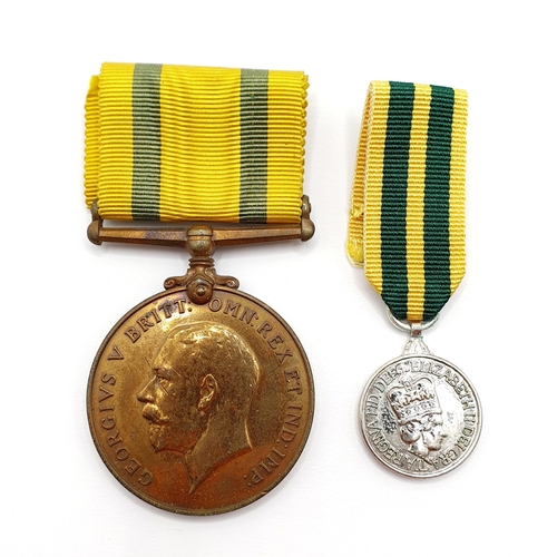 161 - A Territorial Force Medal, 1914-19, awarded to 886 Gnr C H Sims RA, with a later associated miniatur... 