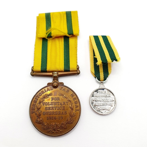 161 - A Territorial Force Medal, 1914-19, awarded to 886 Gnr C H Sims RA, with a later associated miniatur... 