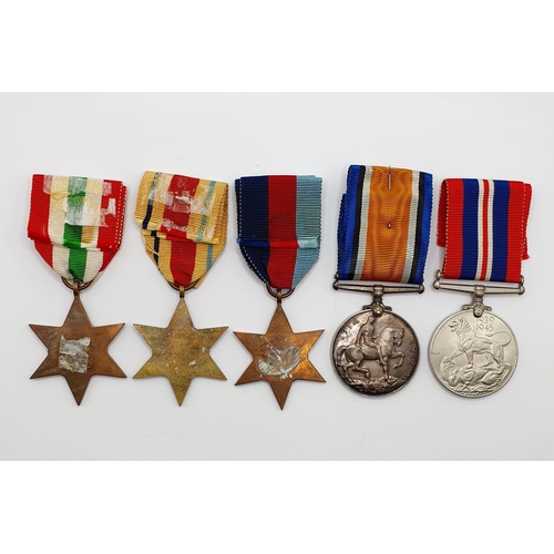 163 - A British War Medal, awarded to 3111 Cpl W G E Shaw Hampshire Regiment, and four WWII medals (5)