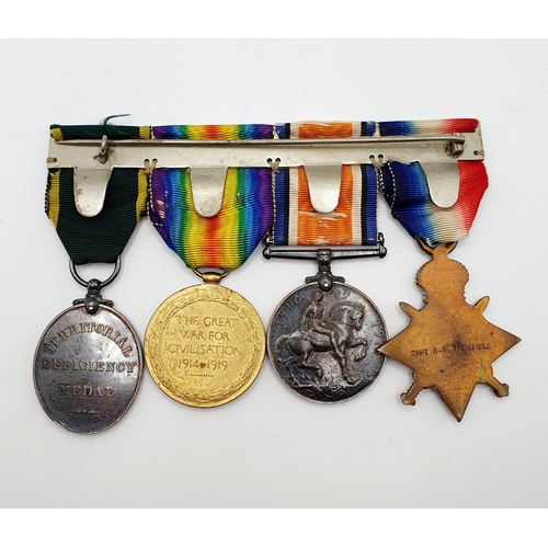 167 - A group of four medals, comprising a 1914-15 Star, a British War Medal, a Victory Medal, and a Terri... 