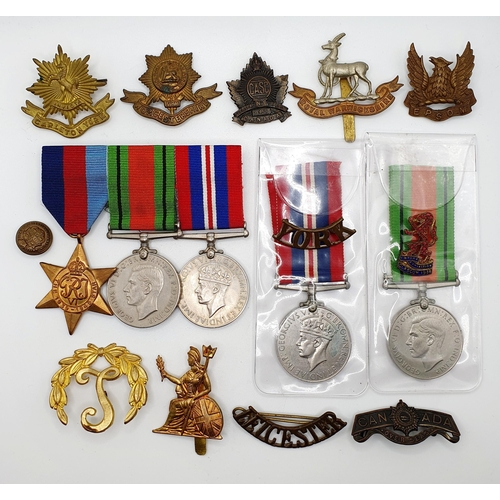 168 - A group of three WWII medals, a pair of WWII medals, and assorted badges