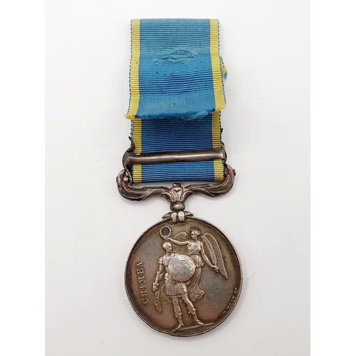 173 - A Crimea medal, named to Vinall RM, with a Sebastopol clasp