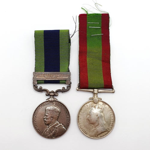 182 - An Indian Service Medal, awarded to 18572 Gnr Saidullah Khan RA, with a North West Frontier 1930-31 ... 