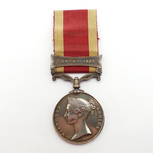 187 - A China Medal, unnamed, with a Canton 1857 clasp