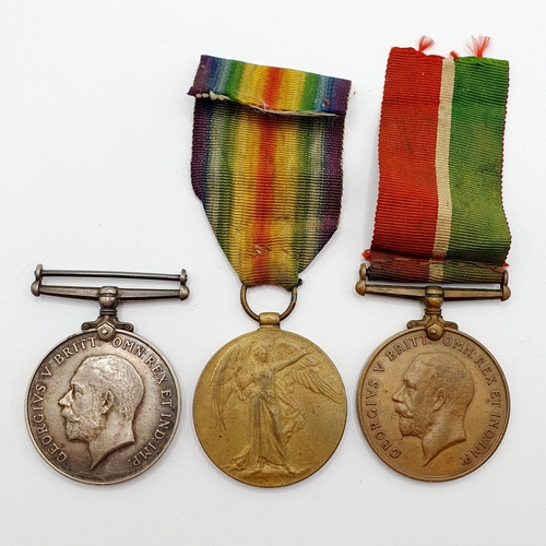 191 - A group of three medals, comprising a pair of WWI medals, and a Mercantile Marine Medal, awarded to ... 