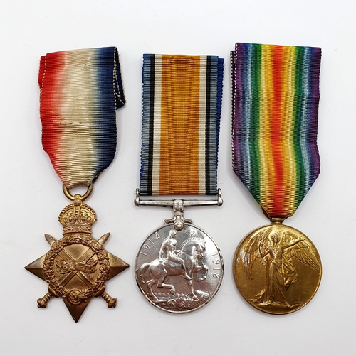 197 - A 1914-15 Star trio, awarded 2573 Pte T Dicker Welsh Reg