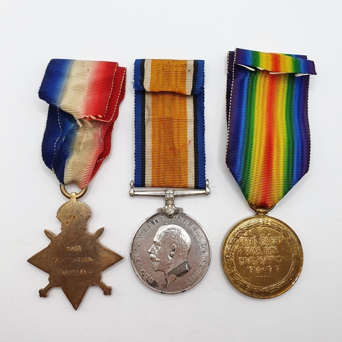 197 - A 1914-15 Star trio, awarded 2573 Pte T Dicker Welsh Reg