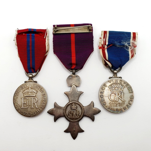 212 - An OBE, a George VI Coronation medal, and an Elizabeth II Coronation medal