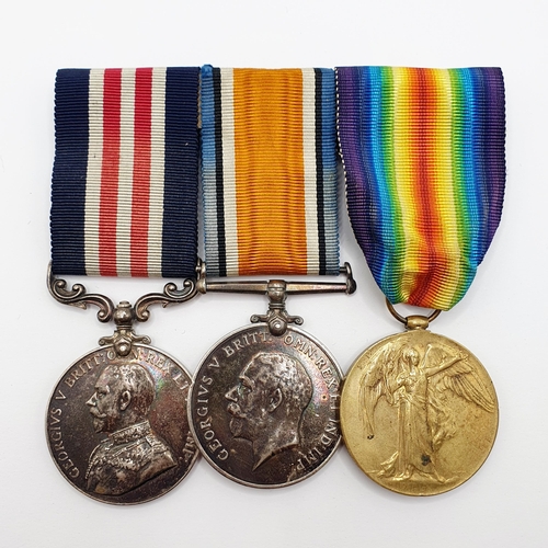 214 - A trio of medals, comprising a Military Medal, and a pair of WWI medals, awarded to 20016 L Sgt T Tr... 