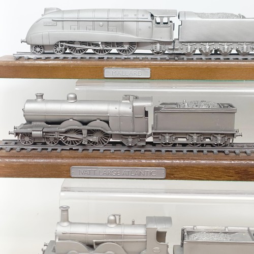 407 - A Danbury Mint pewter model of the Evening Star locomotive and tender, on a wooden base, assorted ot... 