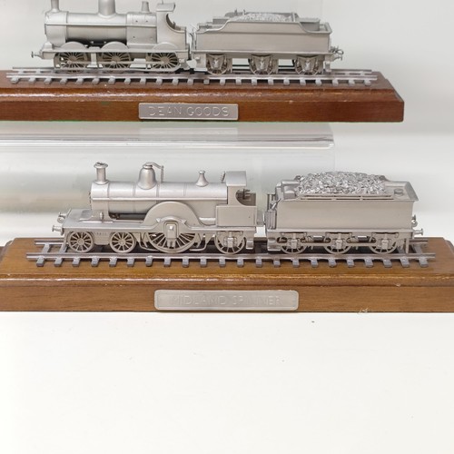 407 - A Danbury Mint pewter model of the Evening Star locomotive and tender, on a wooden base, assorted ot... 