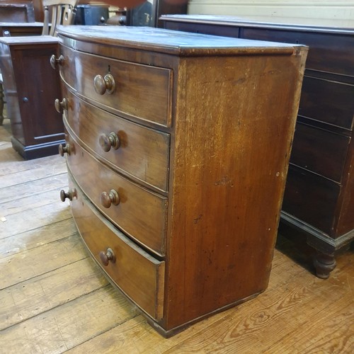 527 - A mahogany chest, having two short and three long drawers, 117 cm wide, and a mahogany bow front che... 