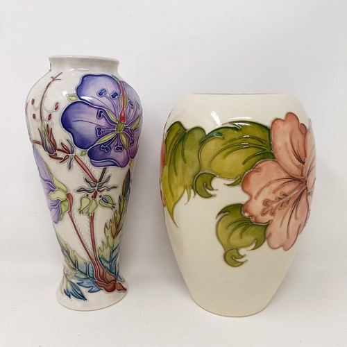 338 - A Moorcroft Pottery Cranes Bill vase, 2001, 20.5 cm high, and another Moorcroft vase, 18 cm high (2)