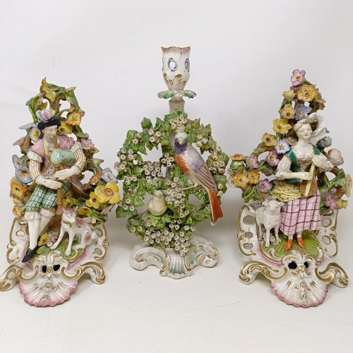 339 - A pair of pottery figures, of seated cats on cushions, 17.5 cm high, a late 19th century Meissen por... 