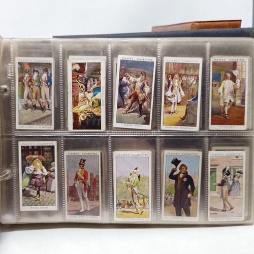 359 - Assorted cigarette cards and postcards, in five albums (5)