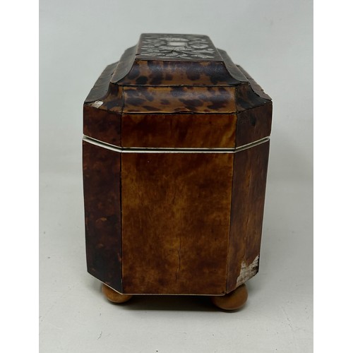 375 - An early 19th century tea caddy, veneered in tortoiseshell and inlaid with mother of pearl, 19 cm wi... 