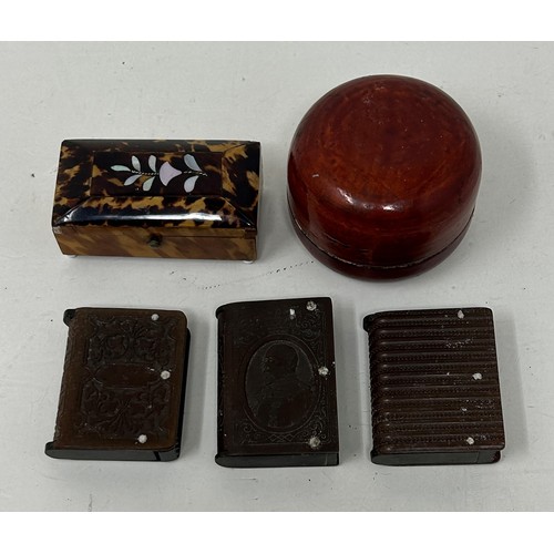 380 - A Victorian box, veneered in tortoiseshell, on ceramic feet, another box and three vestas