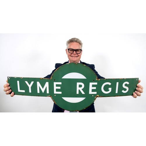 1023 - A Lyme Regis railway station enamel target sign, 33 x 91.5 cm