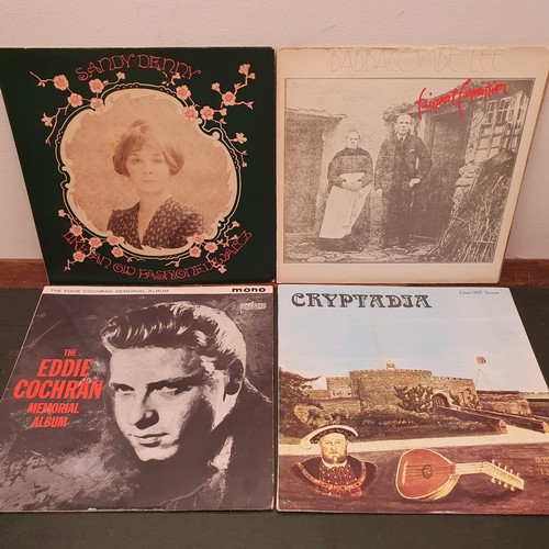 409 - Eric Clapton, Journeyman, vinyl LP record, and assorted other vinyl records 
Provenance: From a larg... 