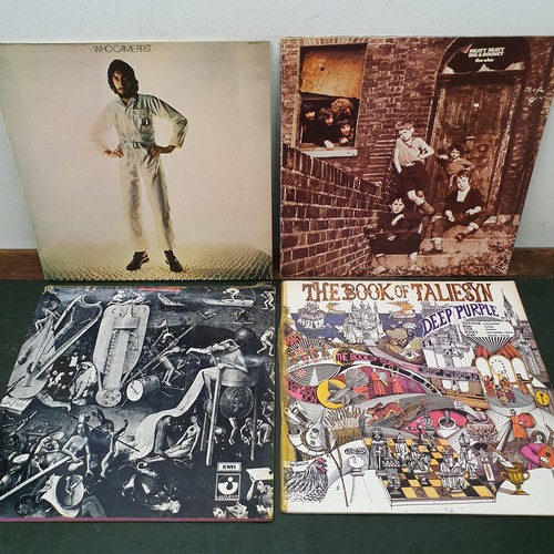 409 - Eric Clapton, Journeyman, vinyl LP record, and assorted other vinyl records 
Provenance: From a larg... 