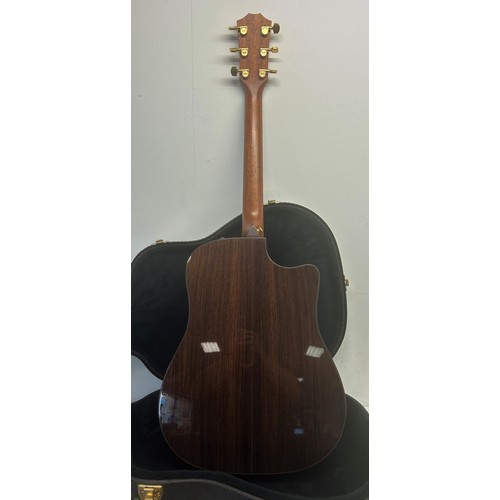 472 - A Taylors guitar, Model 710-CE, Serial No 20050321129, in a hard carry case