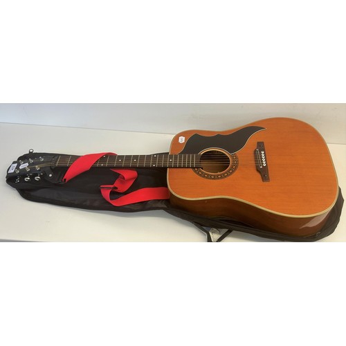 473 - An EKO acoustic guitar, No 219008, in a soft carry case