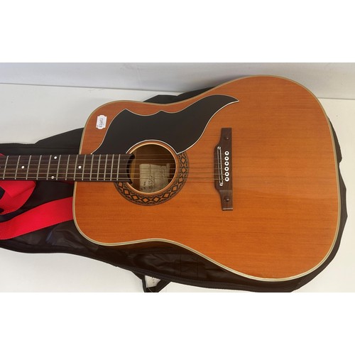 473 - An EKO acoustic guitar, No 219008, in a soft carry case