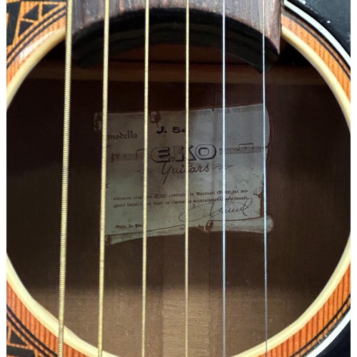 473 - An EKO acoustic guitar, No 219008, in a soft carry case